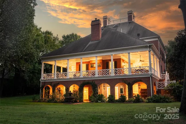 a front view of house with outdoor space and garden