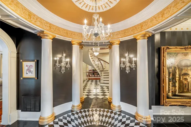 a very nice looking dining room with a chandelier