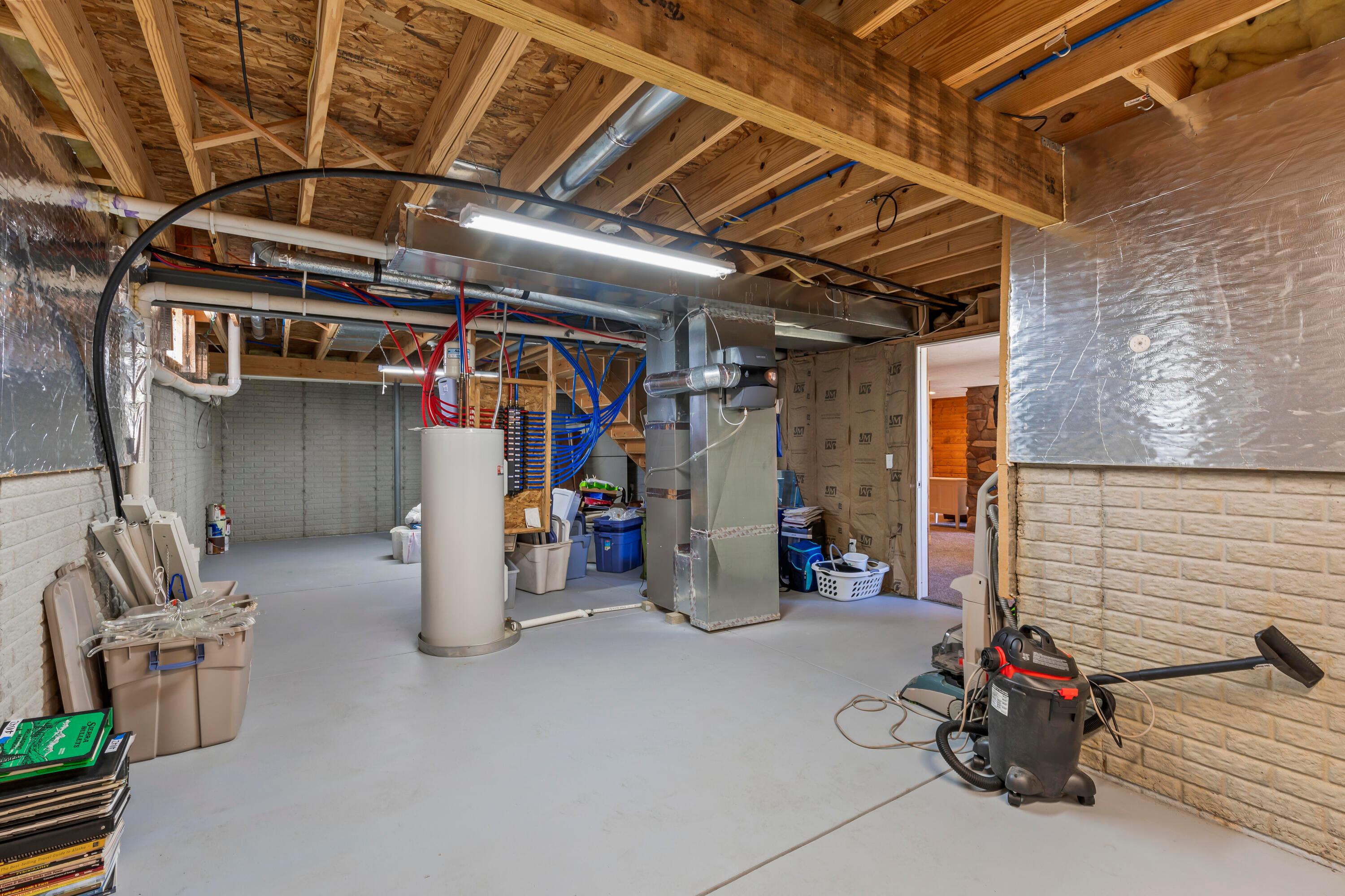 3582 Panhandle Road Delaware, OH 43015 - Photo 46 of 65 • Lennox® natural gas furnace • Clean Comfort® humidifier • Walls partially insulated • AO Smith® electric water heater • Glass block window