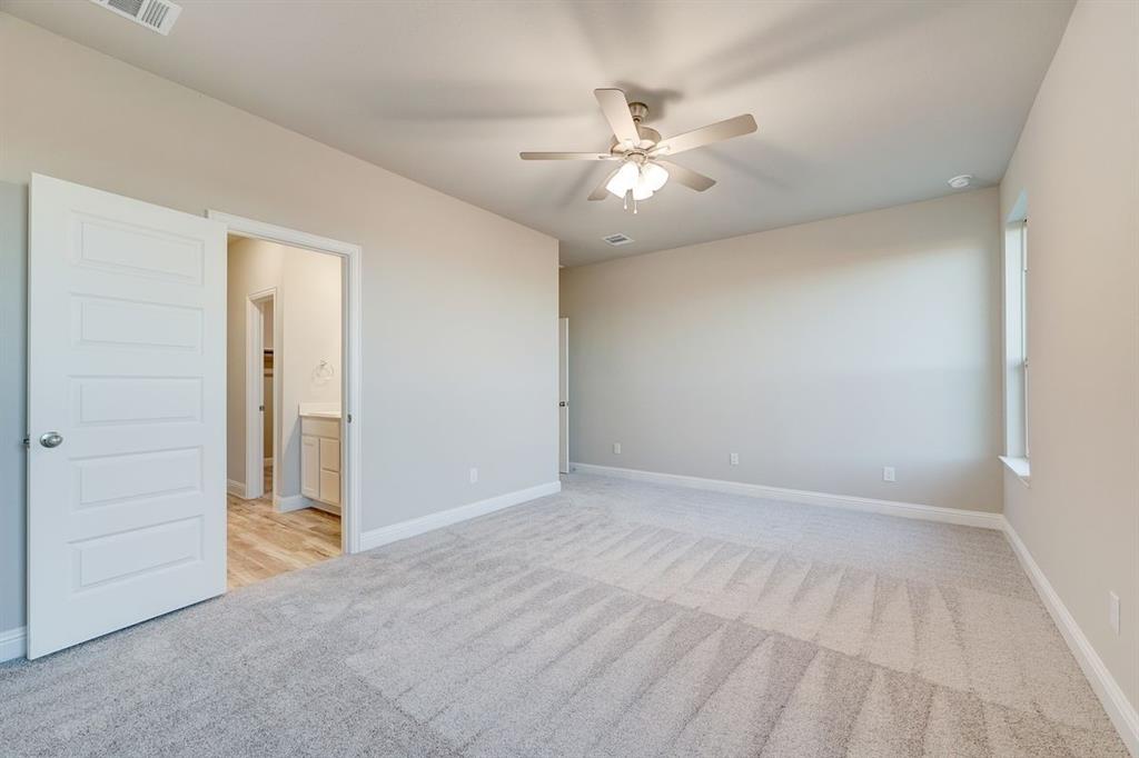 125 Toftrees Drive Cleburne, TX 76031 - Photo 12 of 22 an empty room with closet area