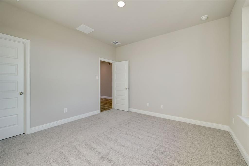 125 Toftrees Drive Cleburne, TX 76031 - Photo 19 of 22 a view of an empty room