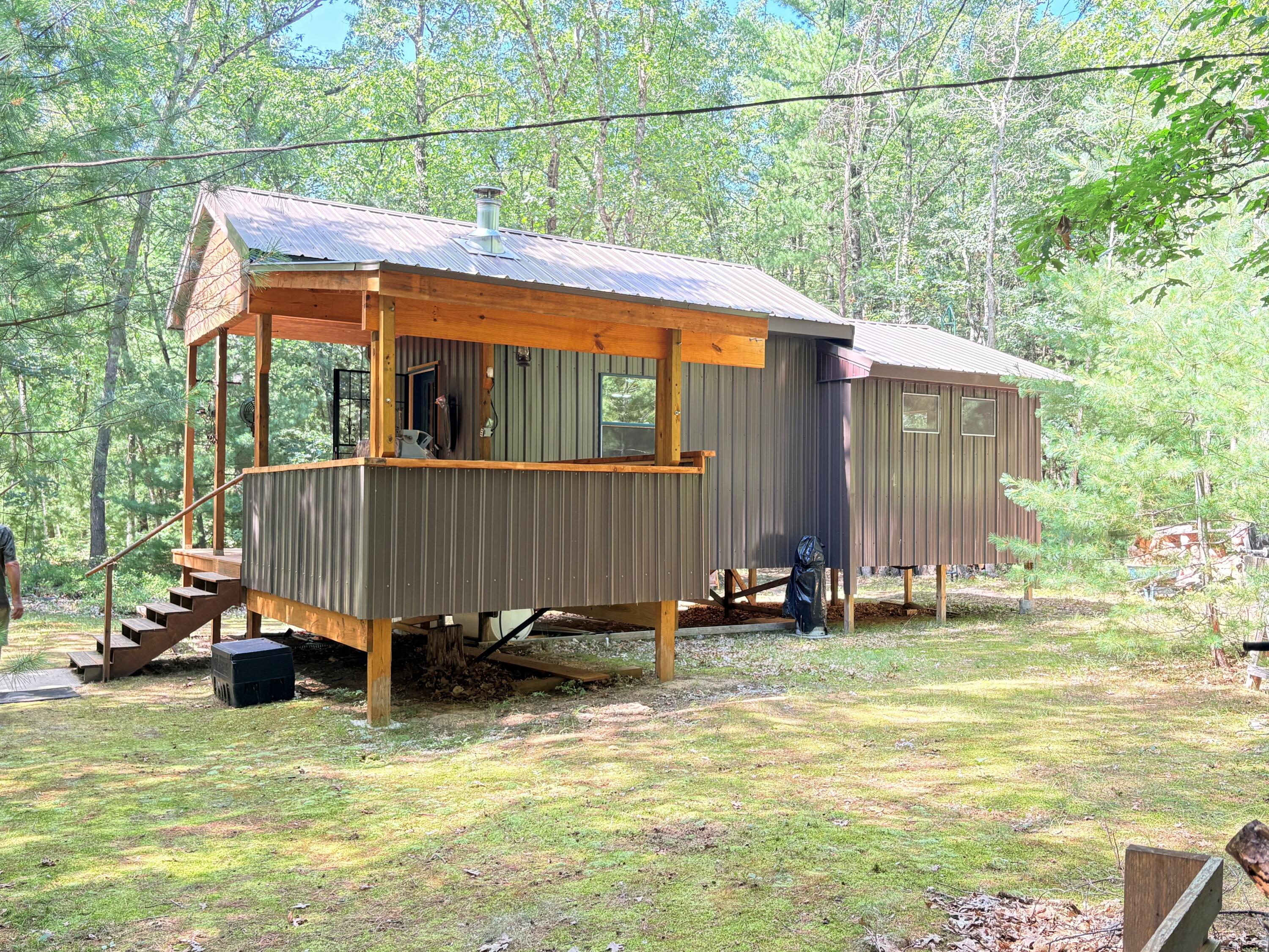 South Skocelas Road South Manistee, MI 49660 - Photo 4 of 64 Cabin exterior 2
