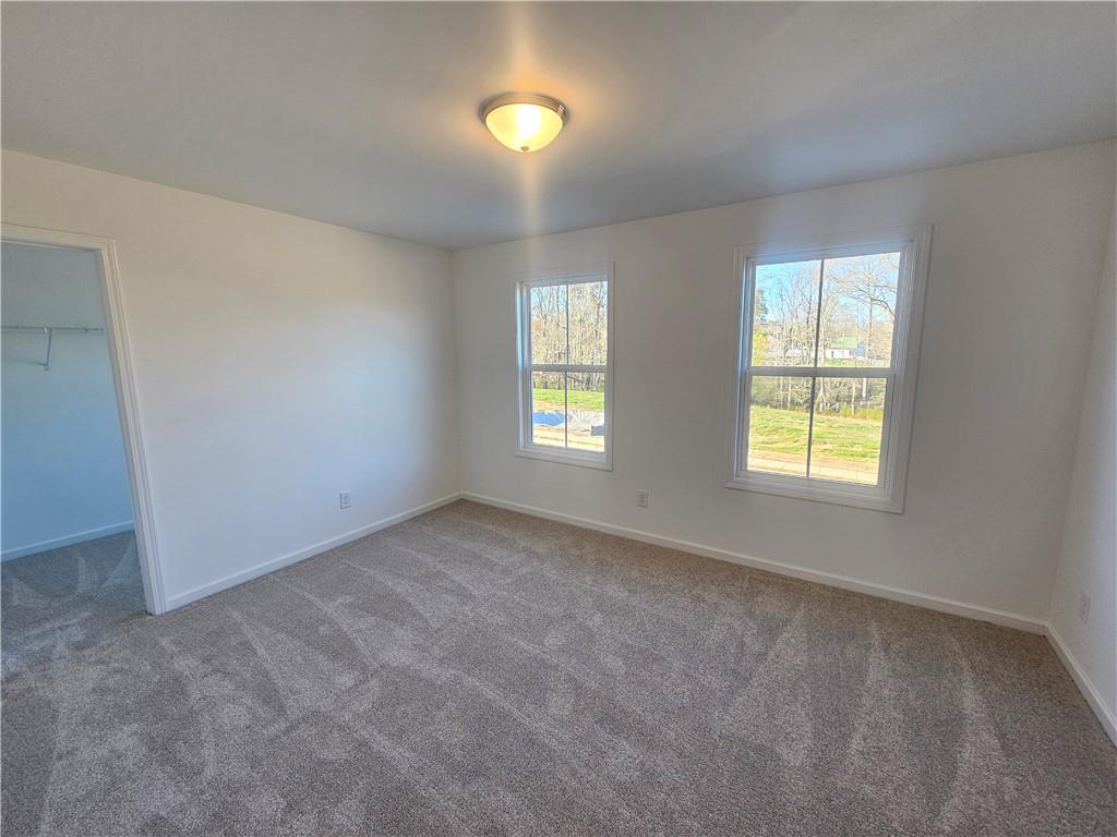 252 Silverleaf Trail Bethlehem, GA 30620 - Photo 15 of 31 an empty room with windows