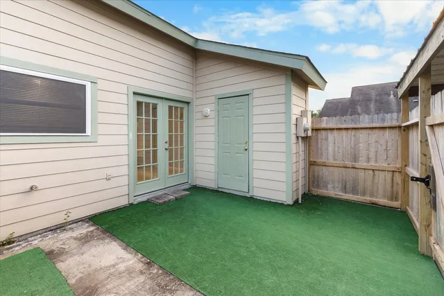 a view of a back yard of the house