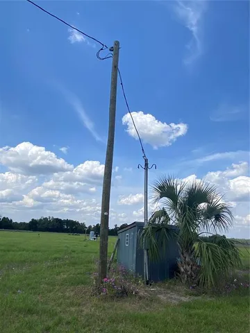 a view of a lake with a big yard