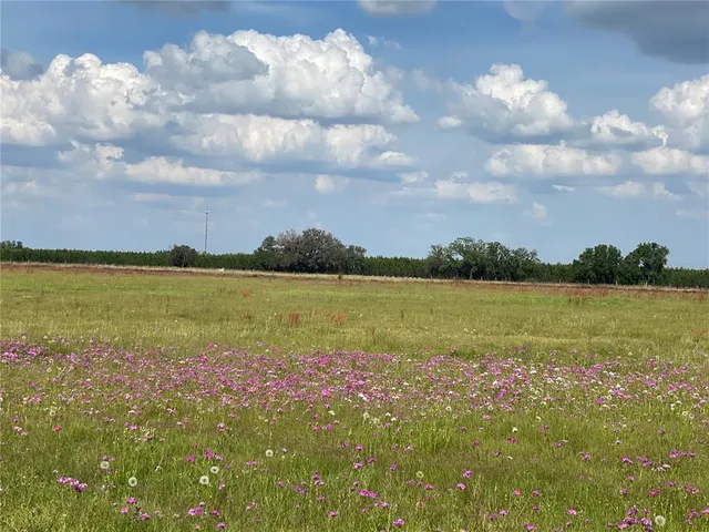 a view of a lake from a balcony