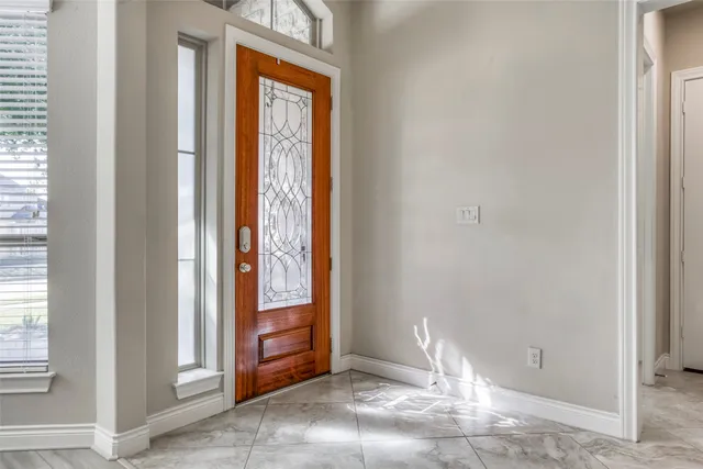 a view of an empty room with window