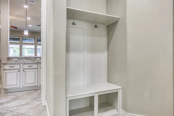 a room with cabinets and window