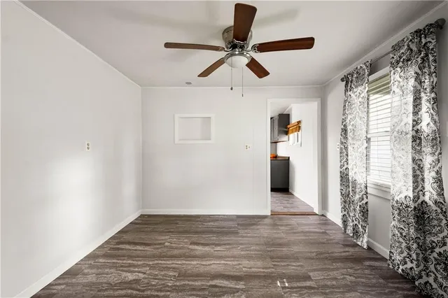 a view of an empty room and window