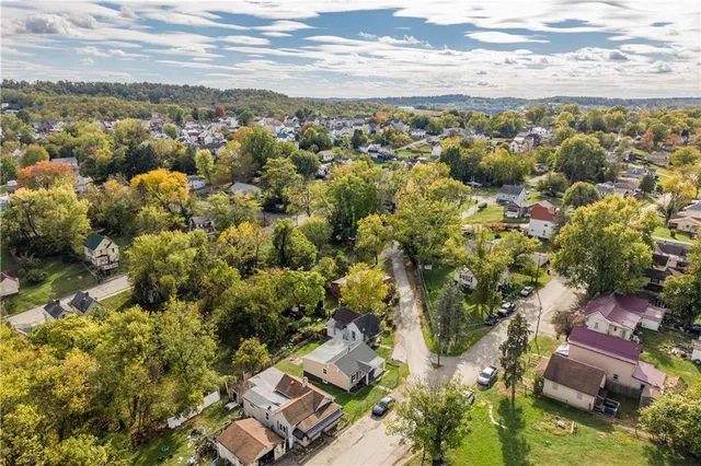 an aerial view of residential building with parking space