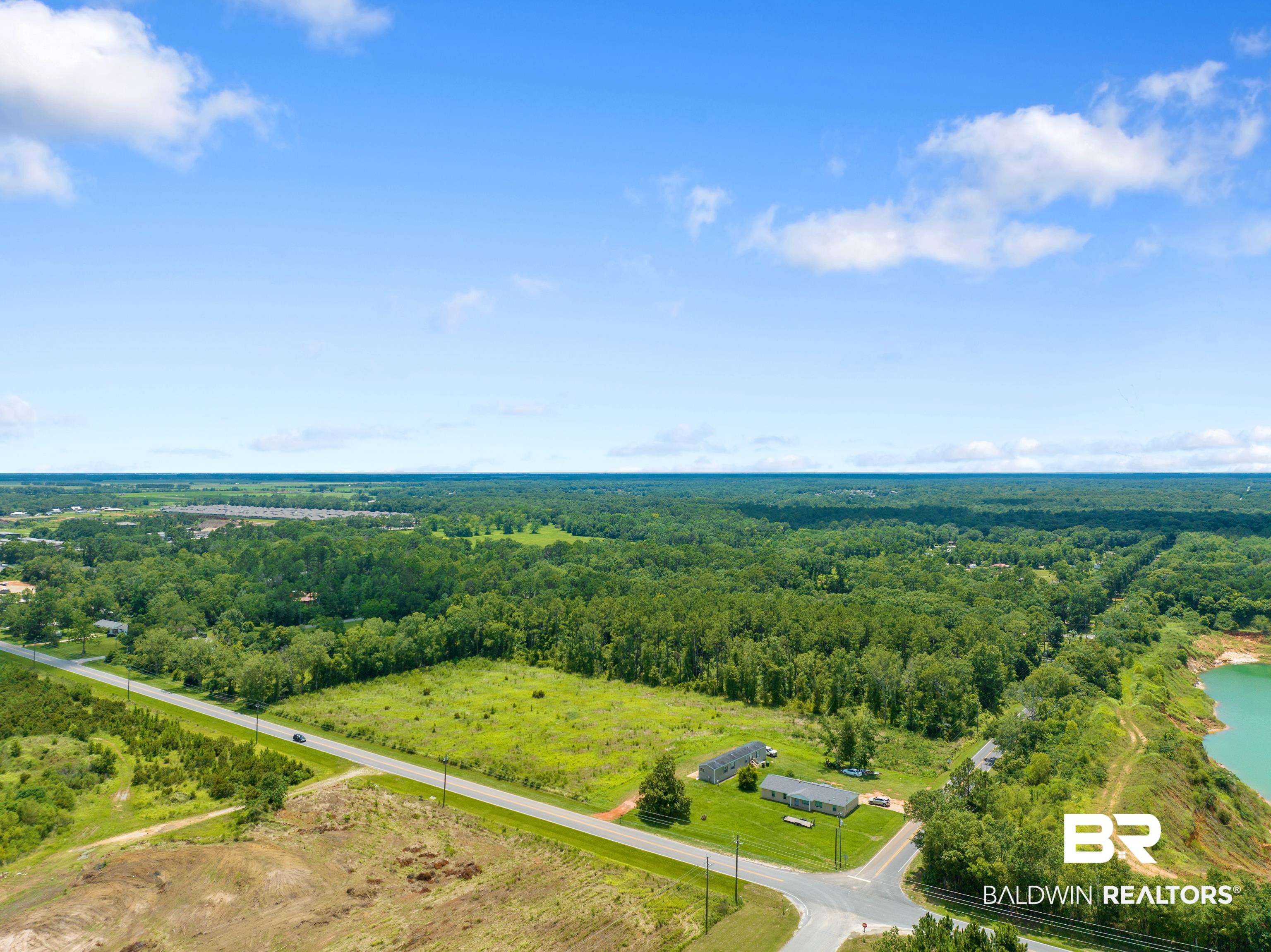 0 Breckner Road Foley, AL 36535 - Photo 3 of 12 Aerial view featuring a water view