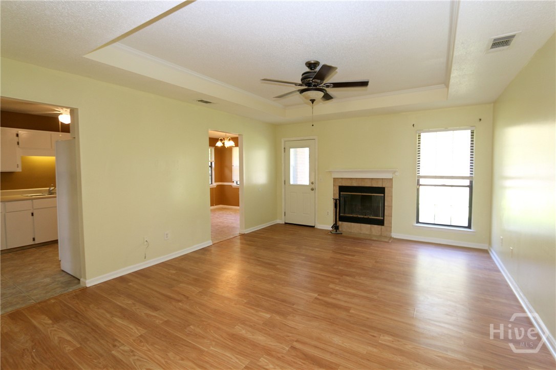 2352 Rowe Street Hinesville, GA 31313 - Photo 5 of 25 Fireside living room with trey ceiling.