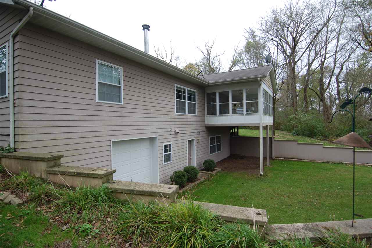 10018 East Campbell Road Davis, IL 61019 - Photo 13 of 15 a front view of house with yard and green space