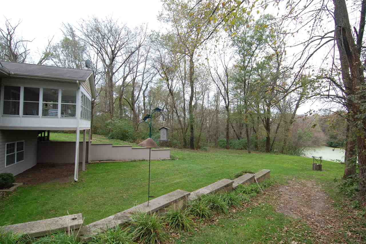 10018 East Campbell Road Davis, IL 61019 - Photo 14 of 15 a view of a house with backyard