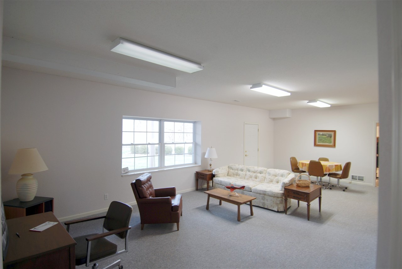 10018 East Campbell Road Davis, IL 61019 - Photo 10 of 15 a living room with furniture and a window