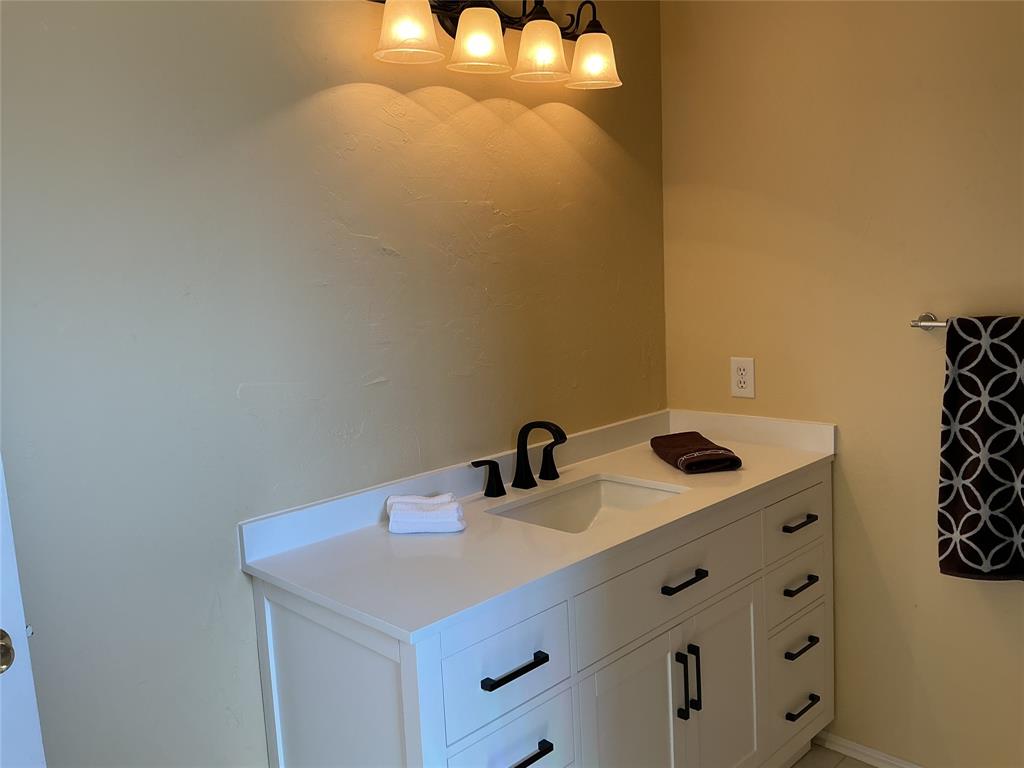 6027 Homestead Court Dallas, TX 75252 - Photo 11 of 23 2nd private full bathroom with new vanity