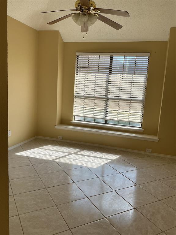 6027 Homestead Court Dallas, TX 75252 - Photo 3 of 23 a room downstairs used as an office