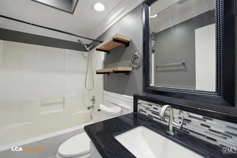 a view of a garage with wooden floor