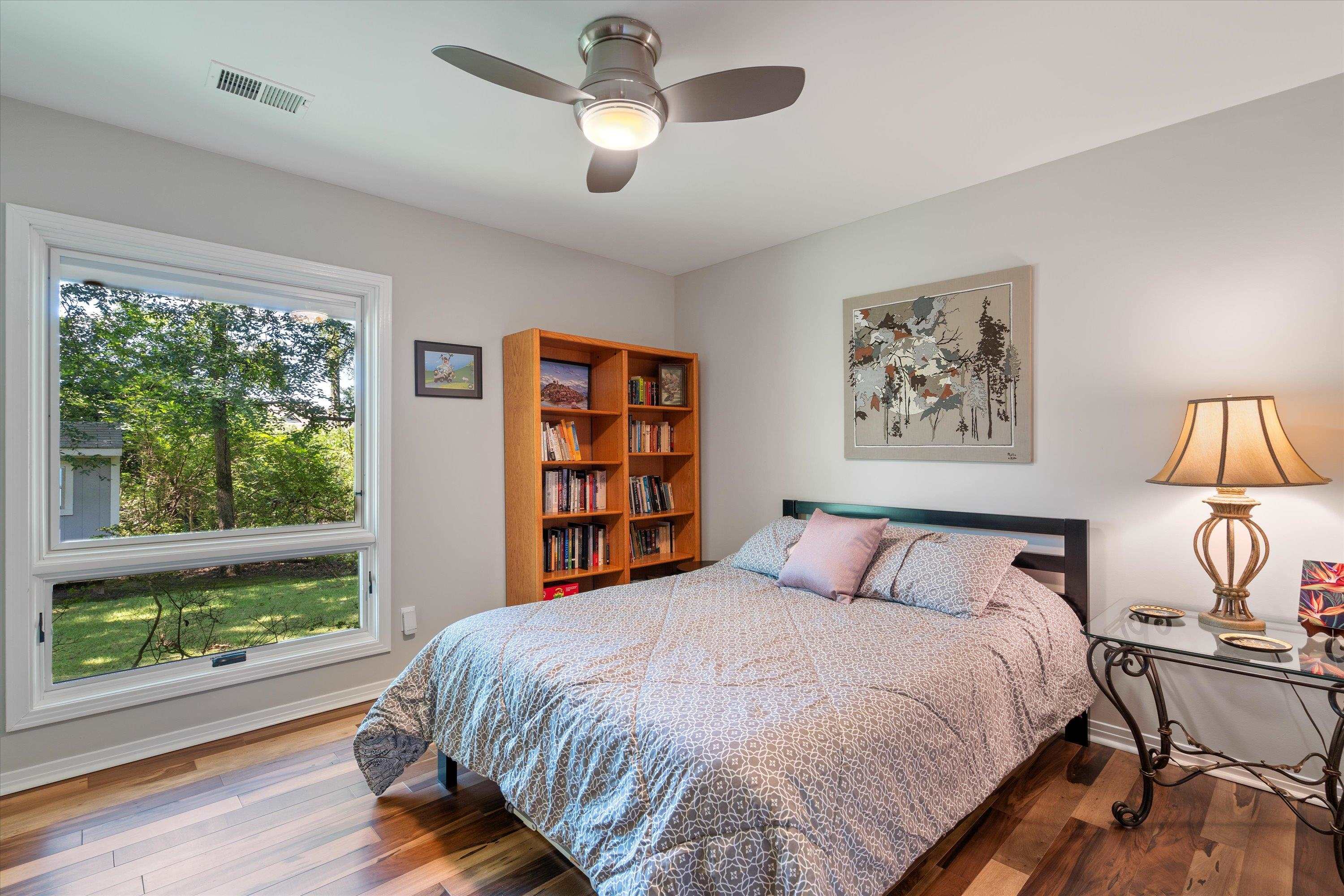 964 Rocky Point Road Memphis, TN 38018 - Photo 20 of 25 a bedroom with a large bed and a window