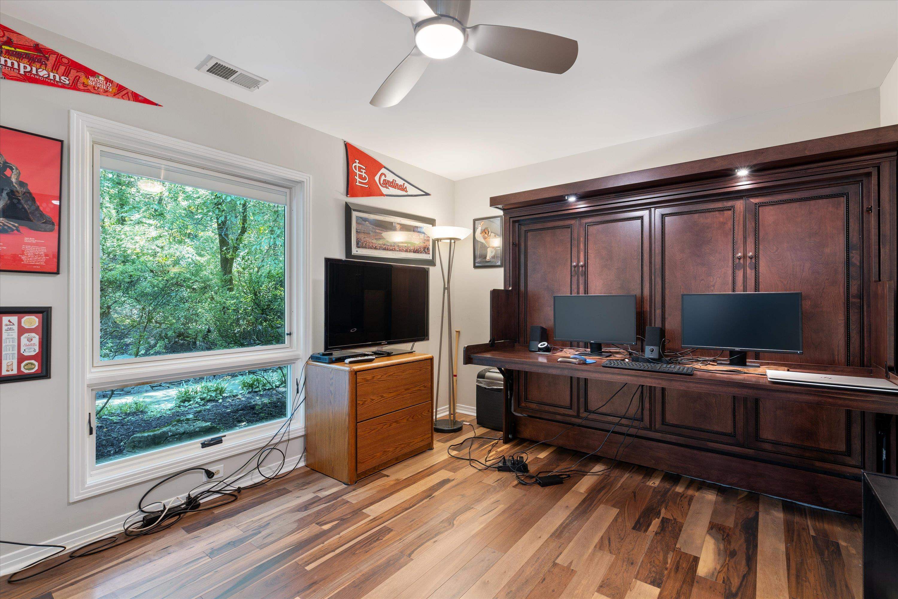 964 Rocky Point Road Memphis, TN 38018 - Photo 21 of 25 a living room with furniture and a flat screen tv