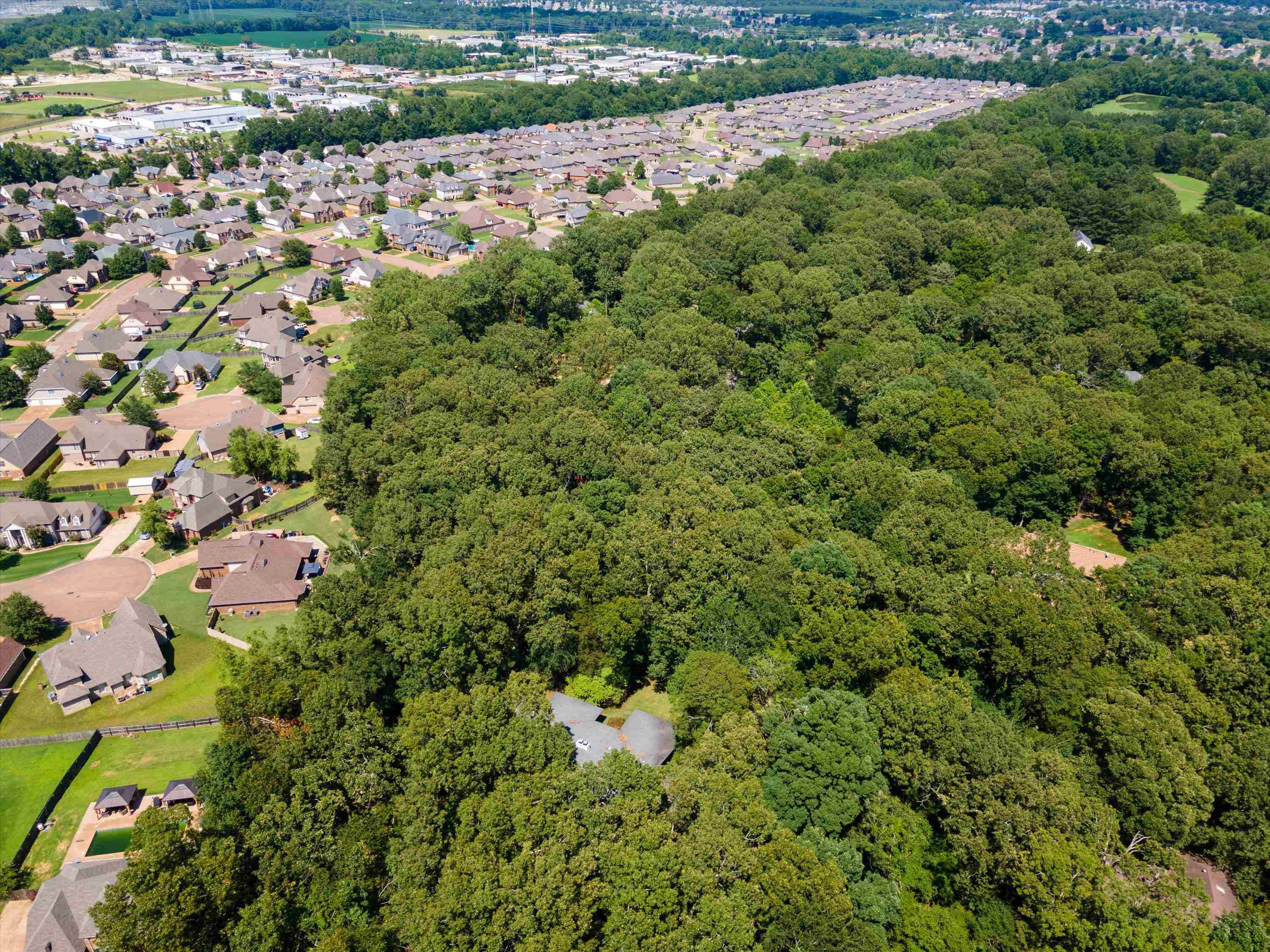 964 Rocky Point Road Memphis, TN 38018 - Photo 25 of 25 an aerial view of residential houses with outdoor space and trees