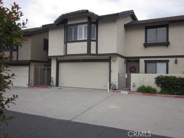 843 Vineyard Avenue Duarte, CA 91010 - Photo 1 of 18 a front view of a house with a garage