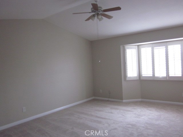 843 Vineyard Avenue Duarte, CA 91010 - Photo 12 of 18 an empty room with a window and a fan