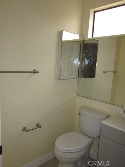 843 Vineyard Avenue Duarte, CA 91010 - Photo 17 of 18 a white toilet sitting next to a shower in a bathroom