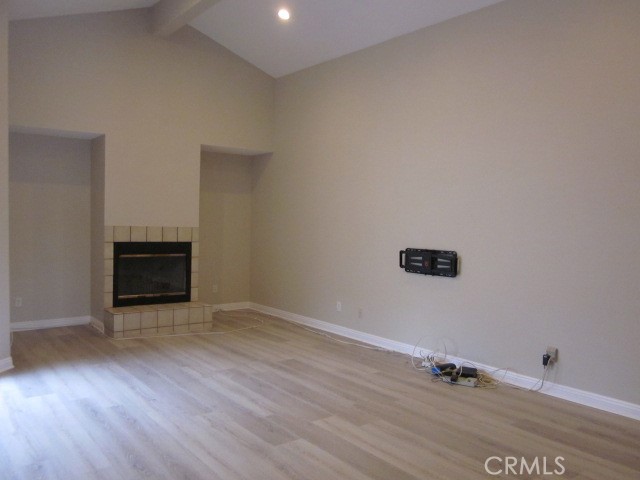 843 Vineyard Avenue Duarte, CA 91010 - Photo 4 of 18 an empty room with wooden floor and windows