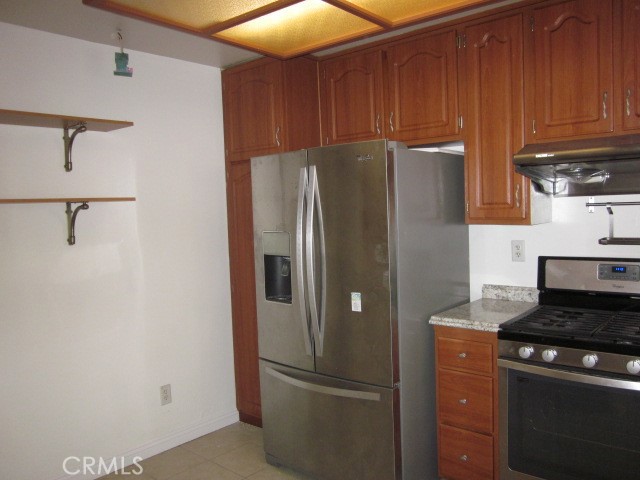 843 Vineyard Avenue Duarte, CA 91010 - Photo 9 of 18 a kitchen with metallic refrigerator freezer and a dishwasher