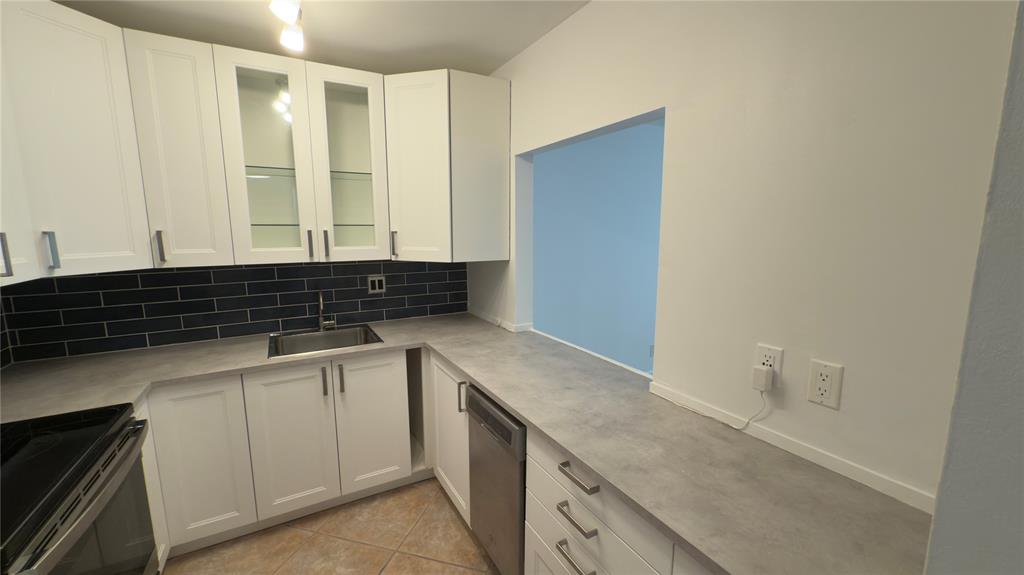 251 South Cypress Road, Unit 127 Pompano Beach, FL 33060 - Photo 11 of 28 Kitchen and Bar Opening