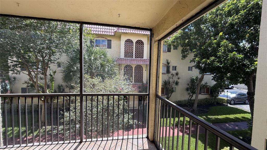 251 South Cypress Road, Unit 127 Pompano Beach, FL 33060 - Photo 13 of 28 Screened in Balcony