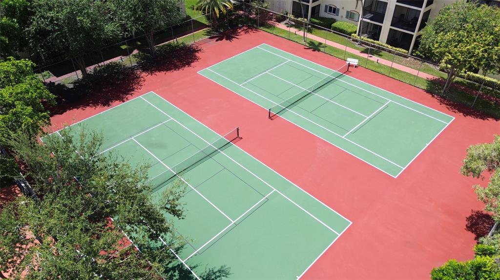 251 South Cypress Road, Unit 127 Pompano Beach, FL 33060 - Photo 16 of 28 Over View of Tennis Courts