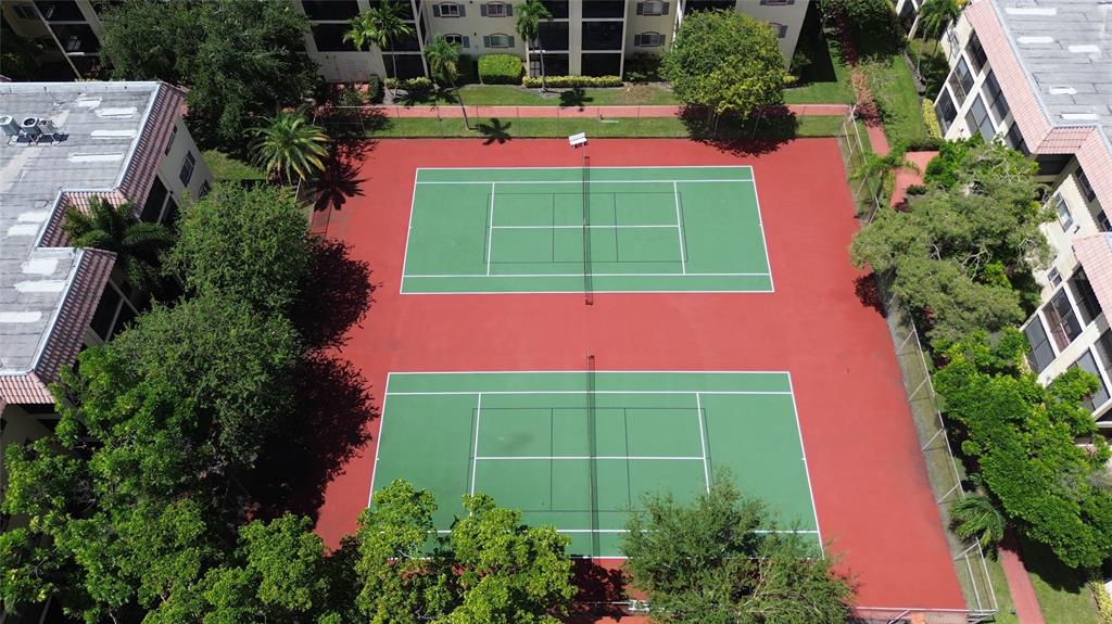 251 South Cypress Road, Unit 127 Pompano Beach, FL 33060 - Photo 7 of 29 an aerial view of a yard
