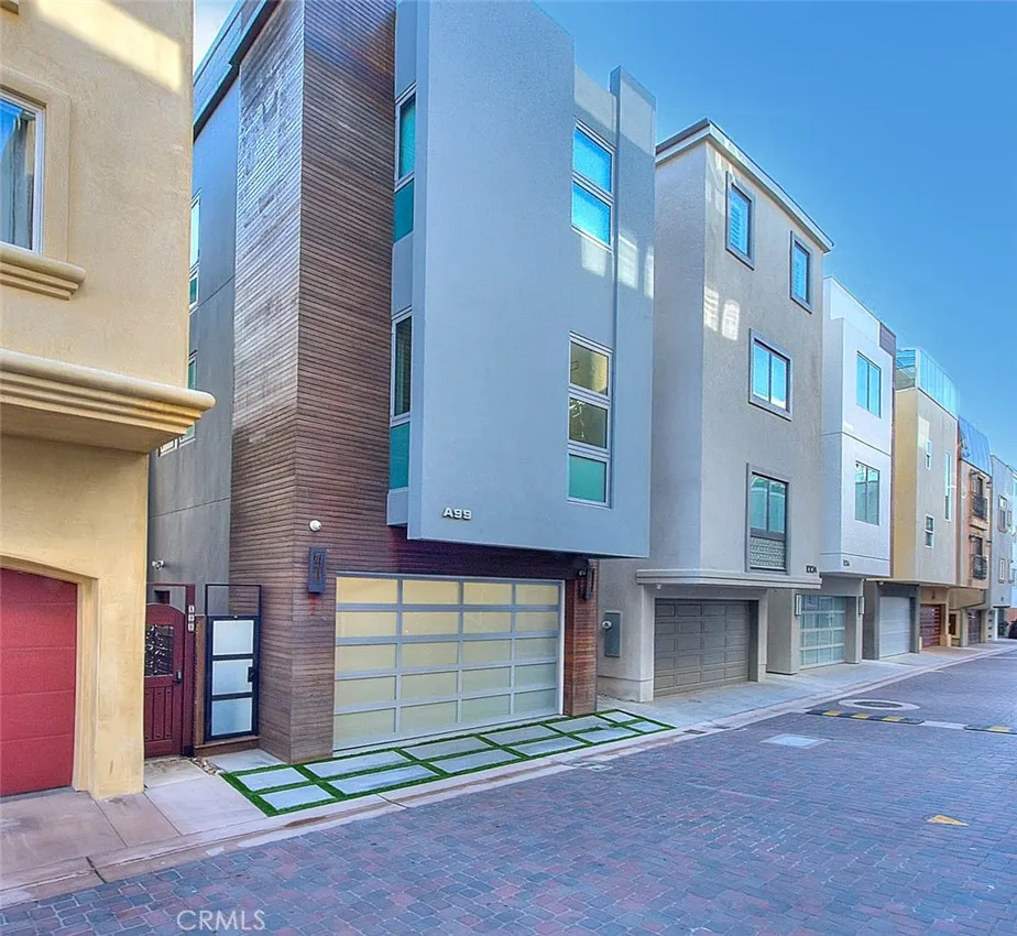 a front view of a building with garage