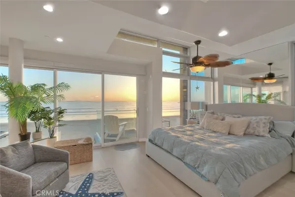 a bedroom with a bed and a cabinet