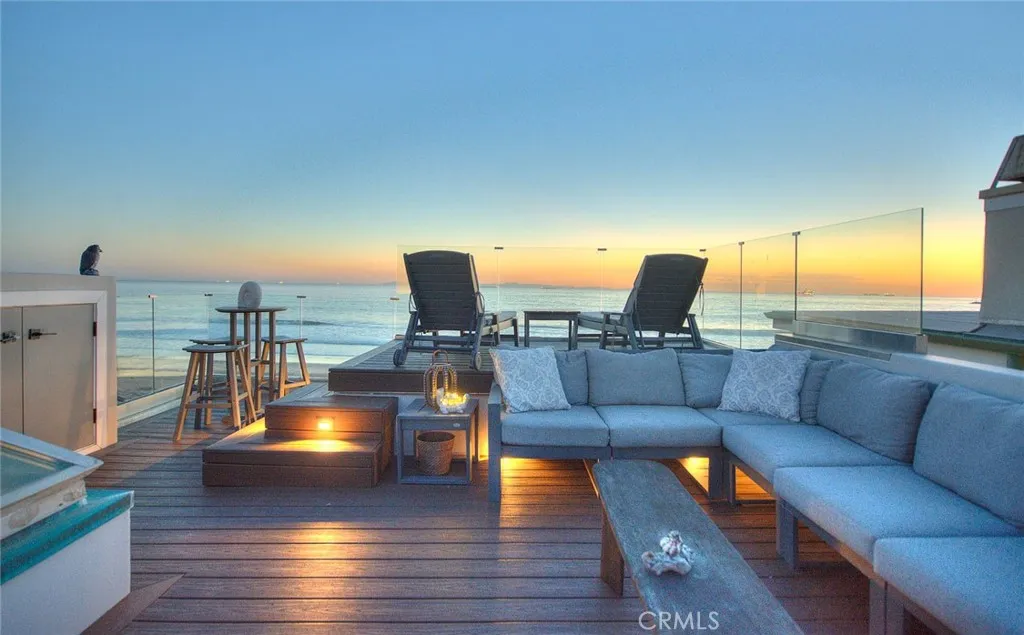 99 Surfside Avenue Surfside, CA 90743 - Photo 54 of 75 a living room with furniture and a large window