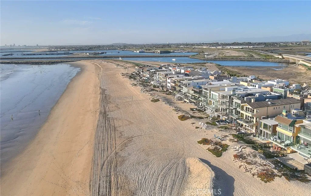 99 Surfside Avenue Surfside, CA 90743 - Photo 65 of 75 a view of an ocean and beach