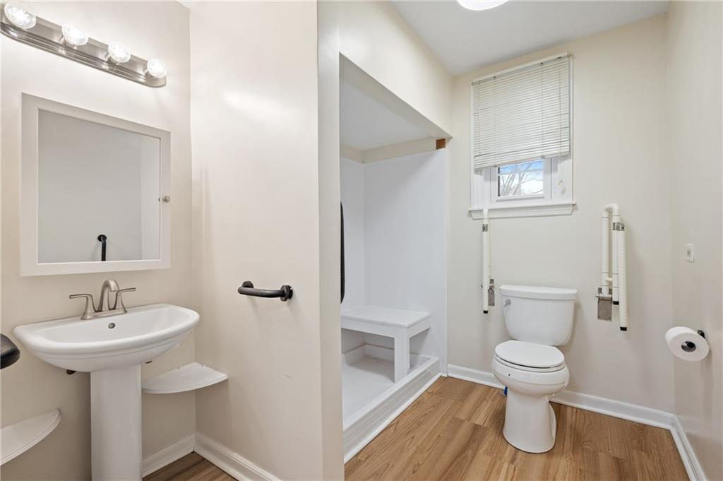 138 Rama Road Beaver Falls, PA 15010 - Photo 14 of 25 a bathroom with a toilet sink and a mirror