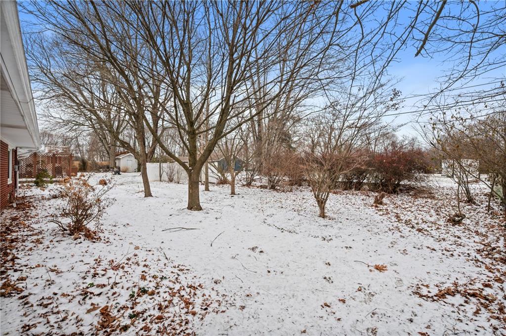 138 Rama Road Beaver Falls, PA 15010 - Photo 21 of 25 a view of white house with a yard covered in snow