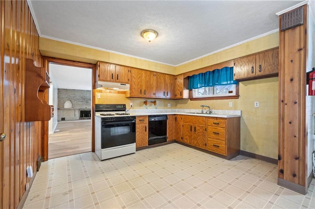 138 Rama Road Beaver Falls, PA 15010 - Photo 7 of 25 a kitchen with stainless steel appliances and cabinets