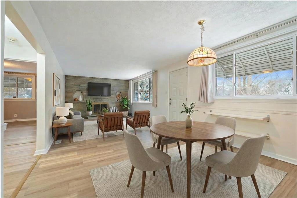 138 Rama Road Beaver Falls, PA 15010 - Photo 9 of 25 a view of a dining room with furniture window and wooden floor
