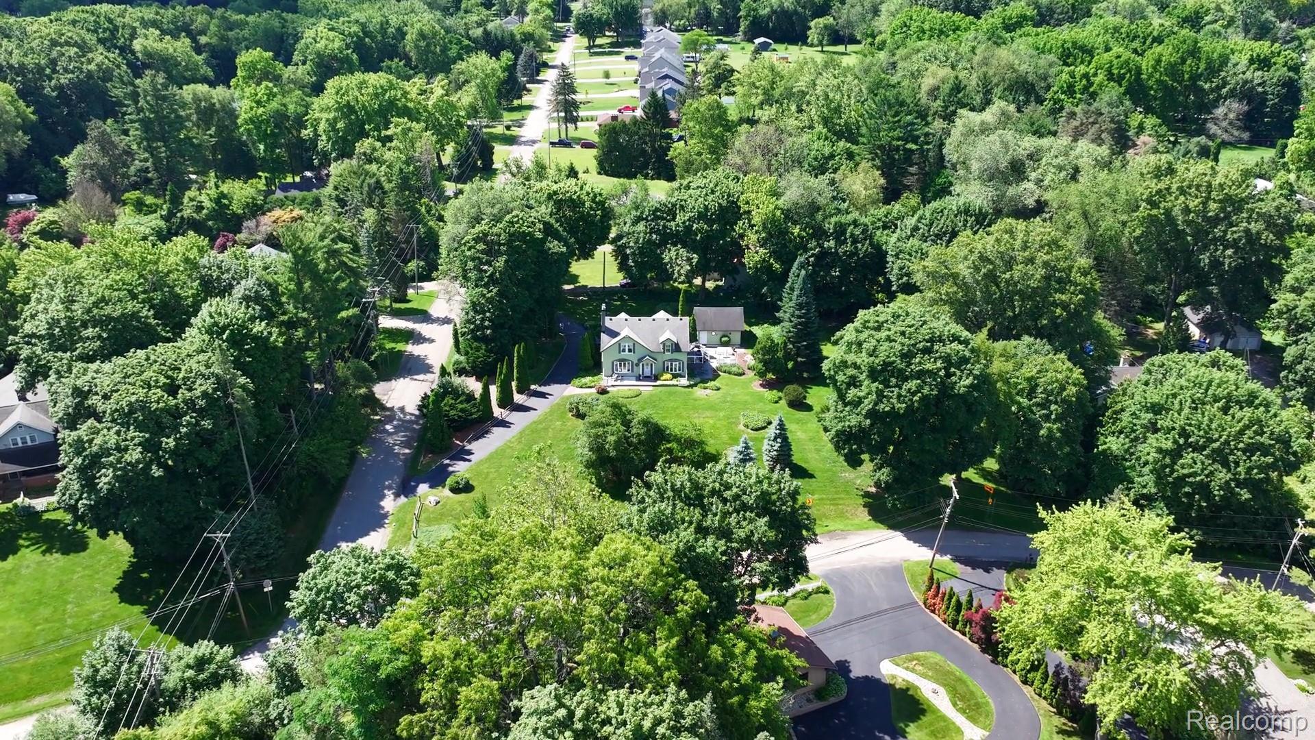 3841 Covert Road Waterford, MI 48328 - Photo 44 of 87 Expansive lot with mature trees and landscaped grounds