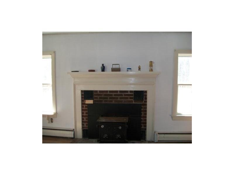 62 Moxie Cove Road Round Pond, ME 04564 - Photo 10 of 20 Living Room. Wood Stove In Living Room
