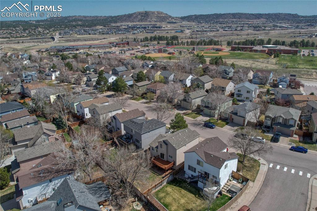 Undisclosed Address Castle Rock, CO 80109 - Photo 11 of 11 an aerial view of a house with a lake view