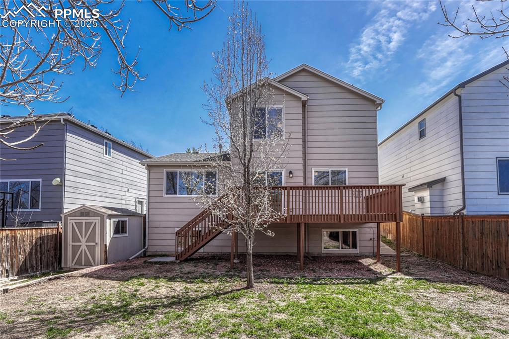 Undisclosed Address Castle Rock, CO 80109 - Photo 2 of 11 a house that has a tree in front of it