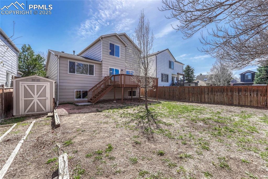 Undisclosed Address Castle Rock, CO 80109 - Photo 6 of 11 a house view with a backyard space
