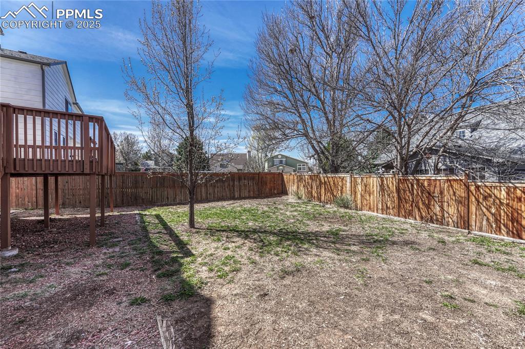 Undisclosed Address Castle Rock, CO 80109 - Photo 7 of 11 a backyard of a house