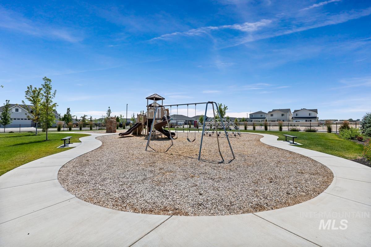 212 East Radiant Ridge Drive Meridian, ID 83642 - Photo 33 of 36 Community playground with a residential view