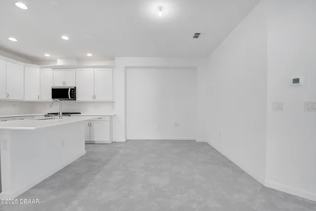 a view of a city with an ocean view